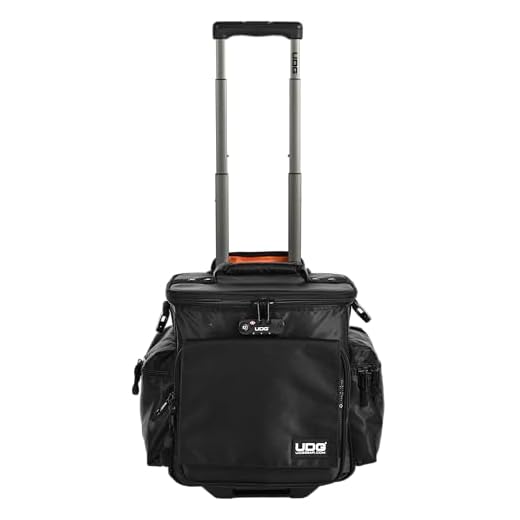 UDG U9981BL/OR Deluxe - Maletín con ruedas para dj (interior de color naranja), color negro