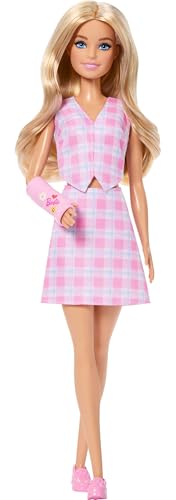 Image of Barbie Fashionistas Doll #243 with Blonde Hair and Pink Arm Cast Accessory, Wearing Plaid Top and Skirt with Pink Loafers