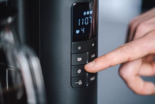 Foto von Melitta AromaFresh X – Filterkaffeemaschine mit integriertem Mahlwerk, Glaskanne und Timer-Funktion, für bis zu 10 Tassen Kaffee, in Schwarz/silber