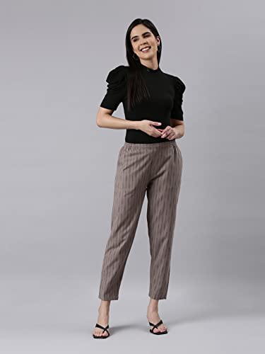 Image of GO COLORS Ikat Print Beige Printed Pencil Pant for Women | Breathable, Side Pocket