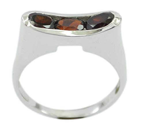 Bague de rotation en argent et grenat un symbole de passion et de paix intérieure