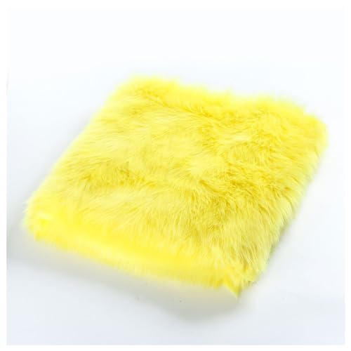 Tissu en fausse fourrure jaune doux pour réparer un col de veste