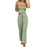 Design : Le débardeur à col V et les applications de dentelle décoratives sur le pantalon apportent une touche ludique à cet ensemble. Sa coupe près du corps et confortable dégage une élégance certaine.