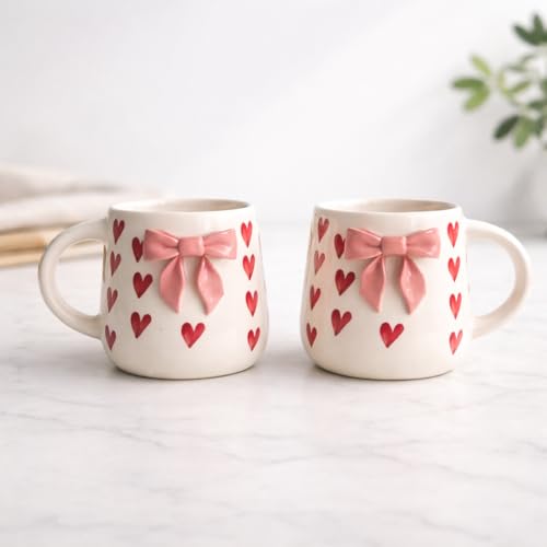 Image of The Deluxe Creations Ceramic Coffee Mug Set of 2 | Handcrafted Bow & Heart Design | Elegant Gift-Style Tea & Coffee Cups | Ideal for Gifting, Couples & Home Decor (Pink Bow Design)