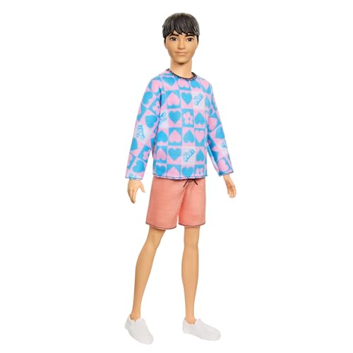 Barbie Fashionistas Ken Doll #219 with Slender Body Wearing a Removable Long-Sleeve Pink & Blue Patterned Shirt & Pink Shorts​