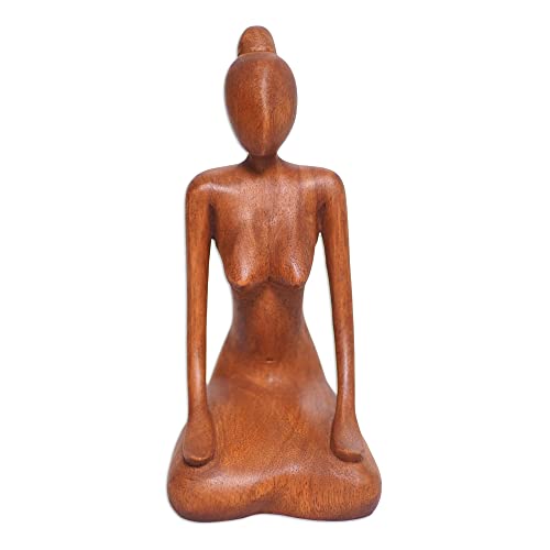 NOVICA Estatuilla de madera Calm Down