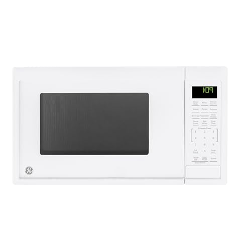 GE Countertop Microwave Oven, Compact 0.9 Cubic Ft., 900-watt Capacity, 7 Auto Cooking Settings, Child-Lock Technology, Kitchen Essentials for The Countertop, Dorm Room or Apartment, White by GE - Used condition - US$101.80