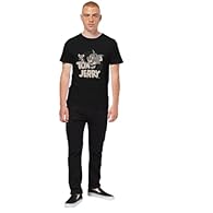 Official Merchandise: Tom & Jerry Circle print on a unisex T-shirt for fans of the classic duo. Iconic design: Bold Tom & Jerry circle artwork, instantly recognizable. Adults sizing: Unisex T-shirt designed for Adults, ideal for everyday casual wear....