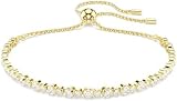 Swarovski Bracelet Tennis de la collection Matrix, avec une alternance de petits et moyens cristaux incolores de taille ronde, fermoir boule coulissante, placage de ton or - 1