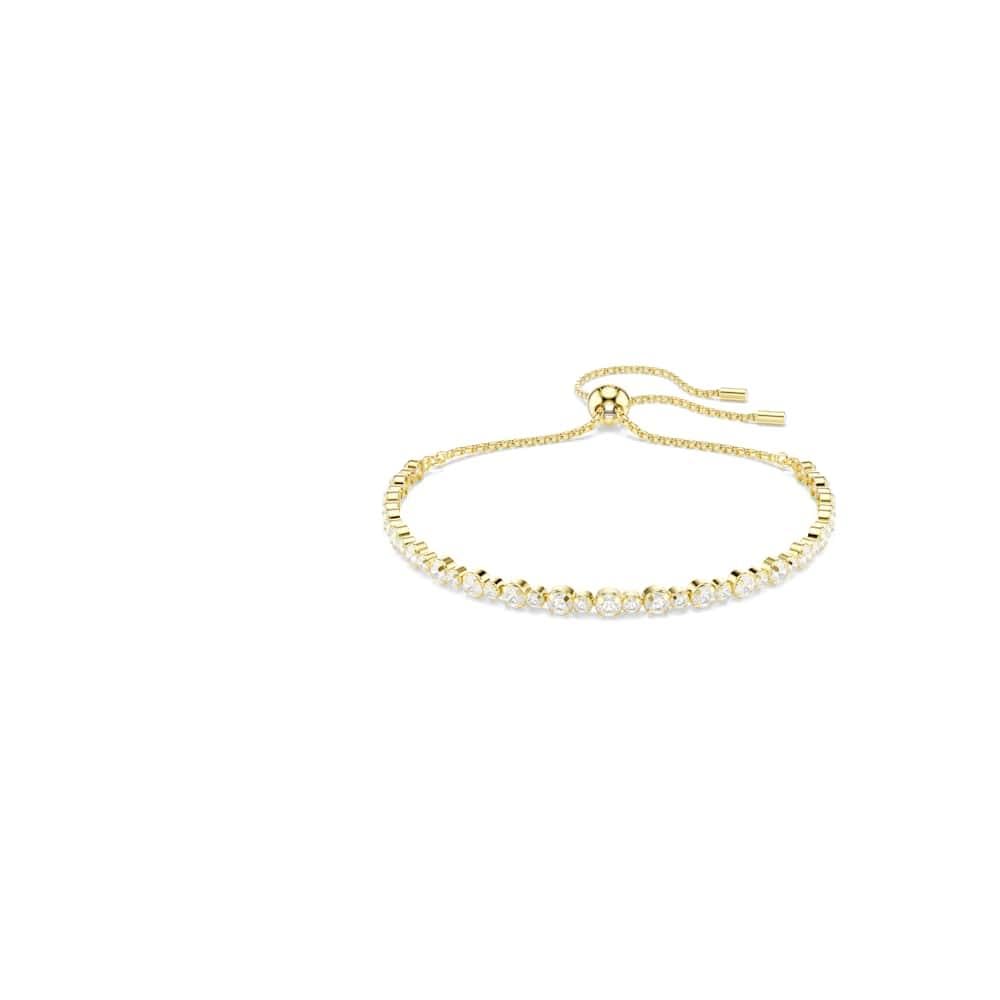 Swarovski Matrix Tennis Bracelet, Clear Round-Cut Crystals in a Gold-Tone Finished Setting, Part of the Matrix Collection