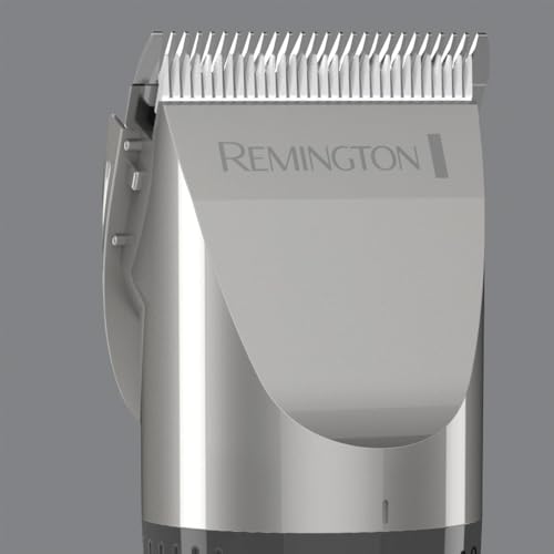Foto von Remington Haarschneidemaschine Profi [selbstschärf. Keramik Klingen/0,8-40mm/Präzisionseinstellung] Haarschneider Set (10 Aufsteckkämme, Netz-/Akkubetrieb, Lithium, Alukoffer, Friseurumhang) HC5811