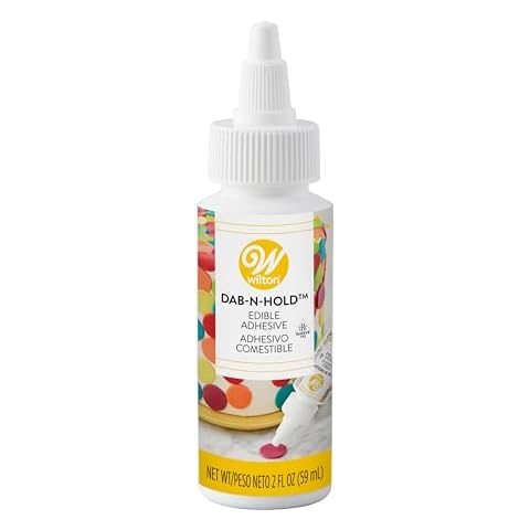 Wilton Dab-N-Hold Edible Adhesive, 2 oz. Cover
