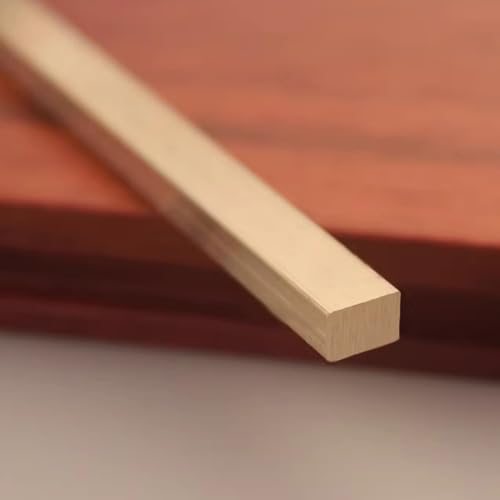 Profilé laiton brossé pour une transition fluide chambre salle de bain