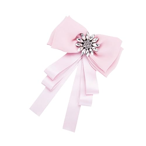 Broche à bowknot d'une finition joaillerie haute fantaisie