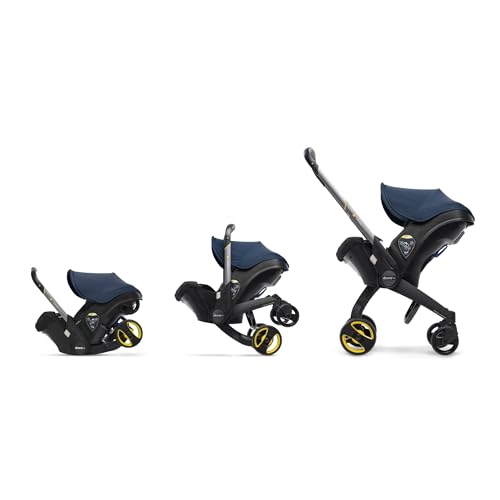 Image of Doona Baby Car Seat & Travel Stroller Deep Blue -Convertible Infant Car Seat, Carry Cot and Pram with 5 Point Safety Harness - Ergonomic Pushchair and Travel System - Latch Base Sold Separately*