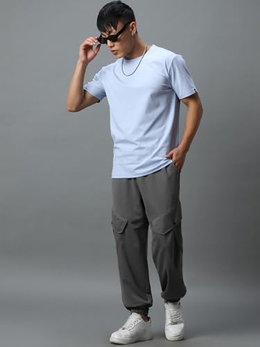 Image of Bewakoof Men's Cotton Super Loose Fit Joggers|Bewakoof Air 1.0 | Track pants for man | Lower for man | Trouser for men | Baggy trackpants for men | Multipurpose | Mens Lower Activewear | Utility Pockets | Lightweight & Flexible Elastic Waist | Casual Joggers | Loose Fit