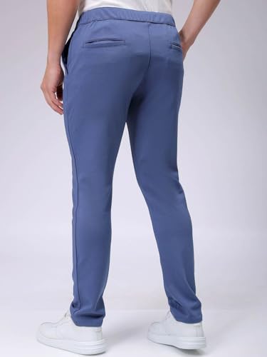 Image of The Indian Garage Co Men Slim Fit Solid Mid-Rise Stretchable Knitted Jogger Trousers