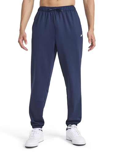 Reebok Men’s Velocity Pant, Standard Fit, 31” Inseam, Lightweight Stretch Air Weave Scuba Fabric, Navy, Medium