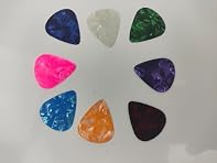 VARIETY PACK: Set of 30 premium celluloid guitar picks in assorted pearlescent colours, featuring thin, medium, and heavy gauges for versatile playing styles THREE THICKNESSES: Includes picks in 0.5mm (thin), 0.75mm (medium), and 1.0mm (heavy) sizes ...