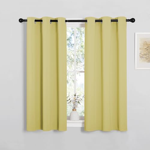Image of NICETOWN Bedroom Curtain Panels Blackout Draperies, Thermal Insulated Solid Grommet Blackout Curtains /Drapes (Paler Yellow, 1 Pair, 34 by 45-inch)