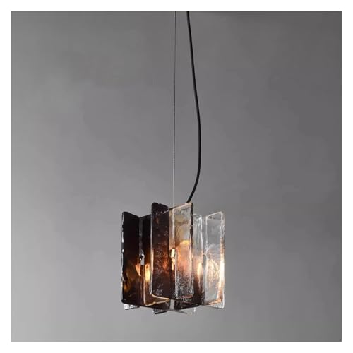 Chandelier verre et cuivre chic pour illuminer une chambre élégante