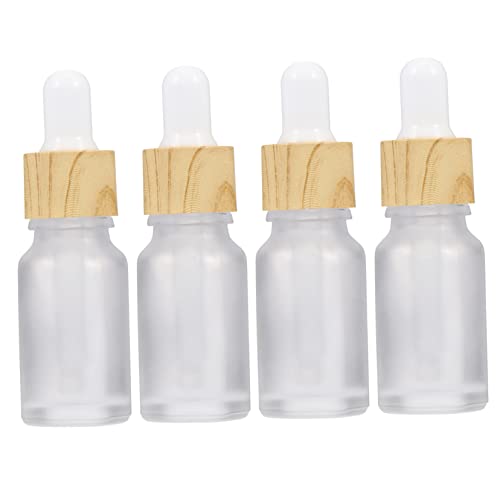 Beaupretty 4 Piezas Frasco cuentagotas de plástico bomba botella de pequeños contenedores de viaje organizador de maquilaje de botella vacía botella de vidrio Transparent