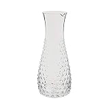Make guests feel special - Pamper your guests by taking Care of their every need; colabora en un guest room, This carafe says "welcome to my home"