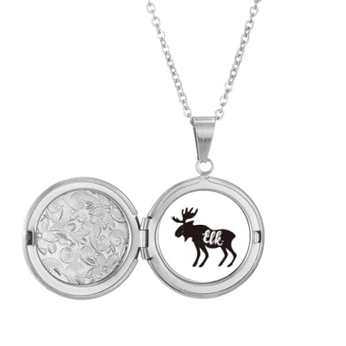 Collier élan noir et blanc médaillon aux finitions d'exception