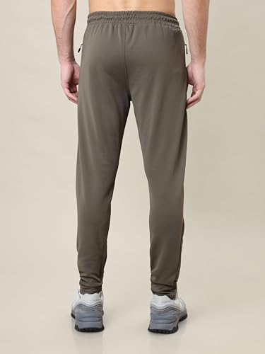 Image of TECHNOSPORT Men's Slim Fit Track Pants with Zip Pockets, ELASTO Plus Quick Dry Stretchable Lightweight Lower for Gym Running Yoga and Sports
