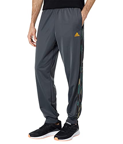 Adidas pantalon de survêtement fuselé respirant en tricot pour homme actif
