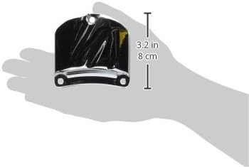 Hand holding a chrome accent piece with dimensions