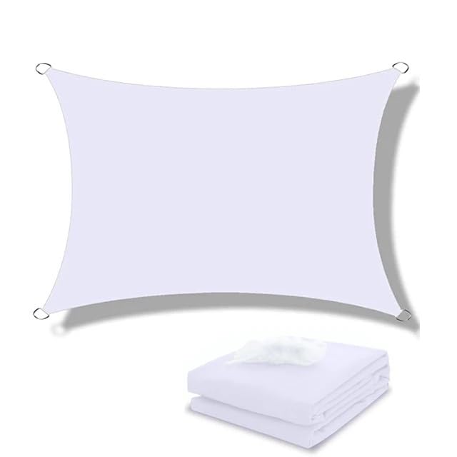 Abri solaire imperméable blanc pour protéger la terrasse de la chaleur