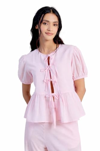 Top péplum en lin rose pour camoufler les rondeurs avec style