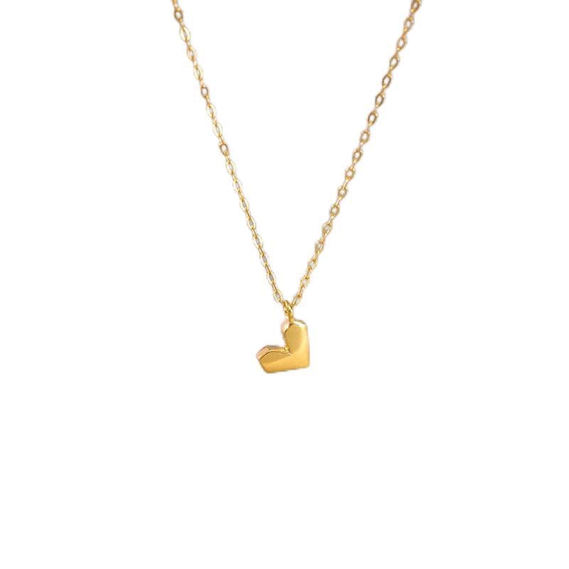 Collier cœur argent S925 aux facettes géométriques et reflets précieux