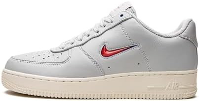 gray nike shoes with red swoosh