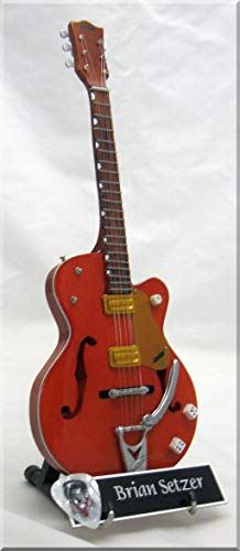 BRIAN SETZER Guitare Miniature STRAY CATS avec médiator - Les Beatles, Paul McCartney, John Lennon, RIngo Starr, George Harrison BRIAN SETZER Guitare Miniature STRAY CATS avec médiator