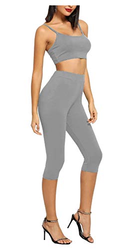 Conjunto deportivo gris elástico de dos piezas con mallas capri 3/4 y top corto