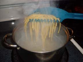 Gadjit Pasta Strain & Serve Pot Strainer, Two-sided Kitchen Tool, One Side Strains Water out of Pasta, the Other Side Lifts and Serves Pasta | A Must-Have for Every Kitchen (White)