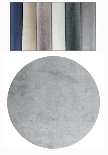 Tapis rond uni gris Tadi & Imperio2006 idéal pour réchauffer un petit salon