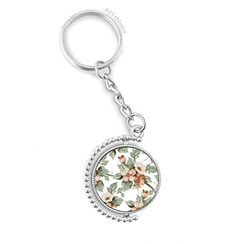 Llavero de rattan con flores delicadas y anillo giratorio un regalo original de diseño floral
