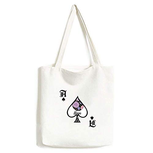 Sac à main en forme de lotus pour sublimer une robe simple grâce au motif fleur