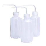 Eine Packung mit 3 Plastikflaschen für Tätowiertinte.