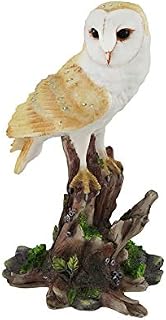Barn Owl Vigilantly Perched on Tree Stump Statue