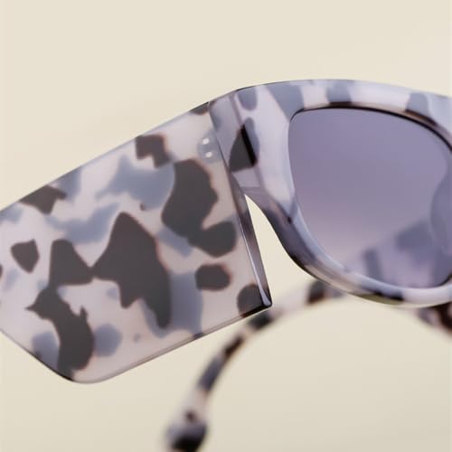 Lunettes de soleil œil de chat à branches larges au design graphique unique
