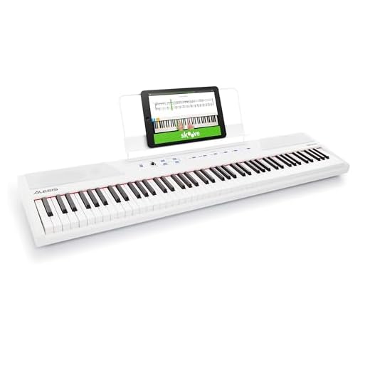 Alesis Recital Piano Eléctrico 88 Teclas Semi Contrapesadas con Altavoces, Lecciones de Piano, Metrónomo y 5 Kits de Sonidos - Blanco