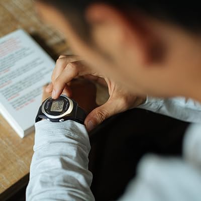 Close-up of the Cadex VibraPlus watch display showing the 'LOCK' indicator.