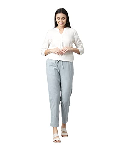 Image of GO COLORS Ikat Print Beige Printed Pencil Pant for Women | Breathable, Side Pocket