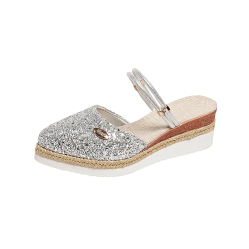 Mules compensées dos nu et bout pointu : la sophistication d'une coupe fermée