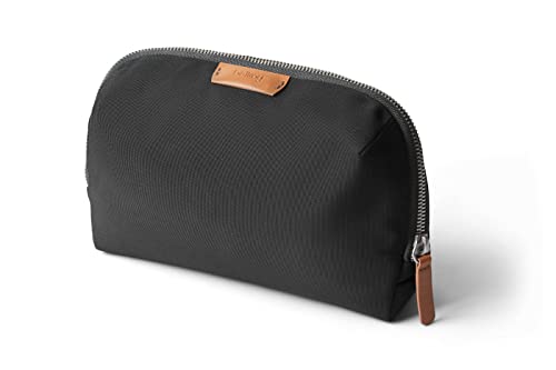 A standing pouch that flips open like a tiny tech wardrobe — zero-unpack access to all your desk gear in one slick reveal.