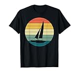 catamarano usato sicilia Perfetto per gli appassionati di catamarano o per tutti coloro che amano i paesaggi oceanici. Lasciate che le vibrazioni vintage e i colori caldi vi trasportino in una tranquilla giornata sull'oceano, abbracciando lo spirito nautico.